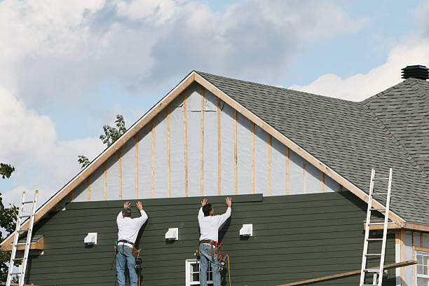 Professional Siding technician working in DeLand, FL